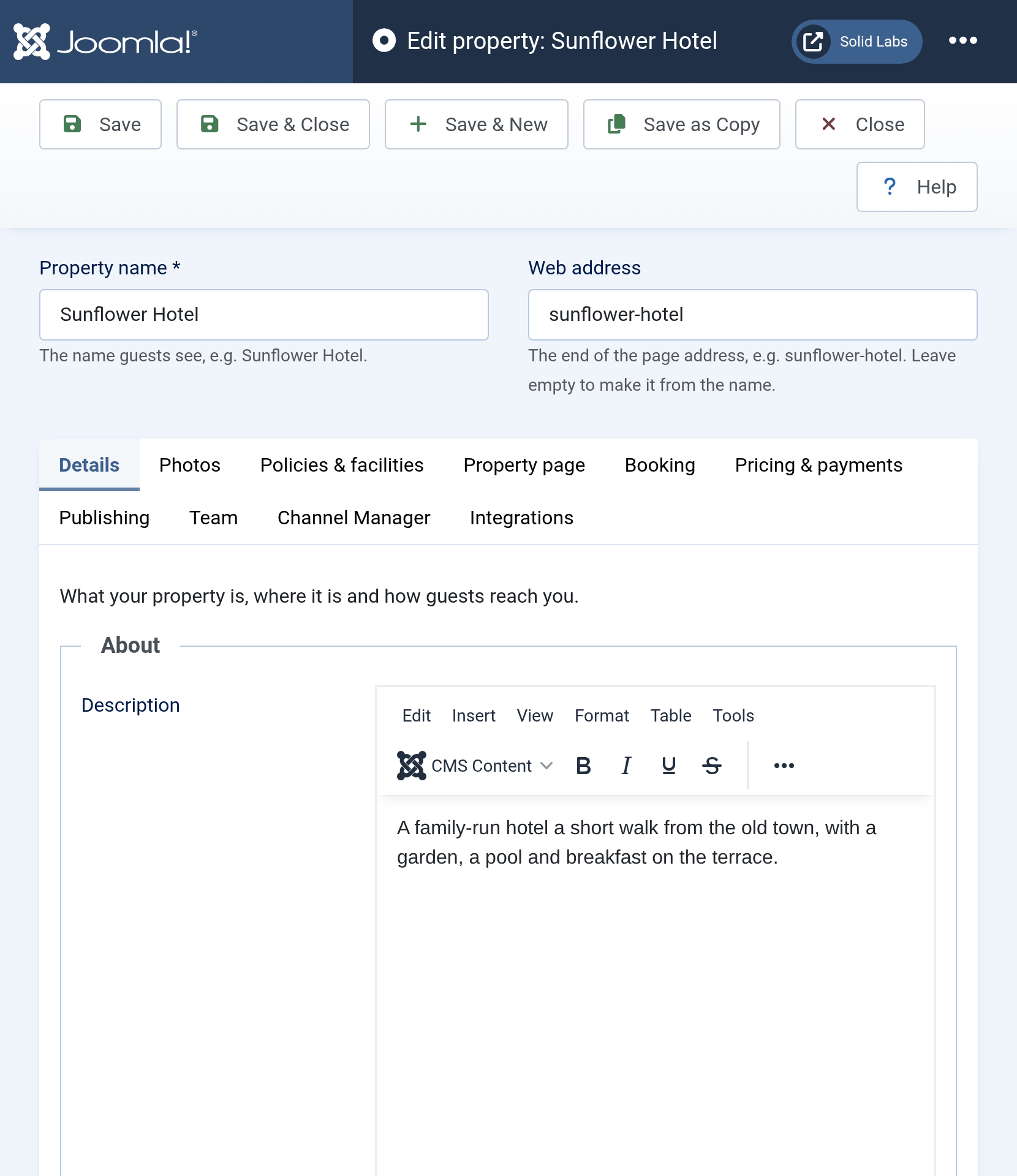 The Solidres property screen: Save buttons and Help in the toolbar, the property name and web address above a row of tabs, and the Details tab open on its About section